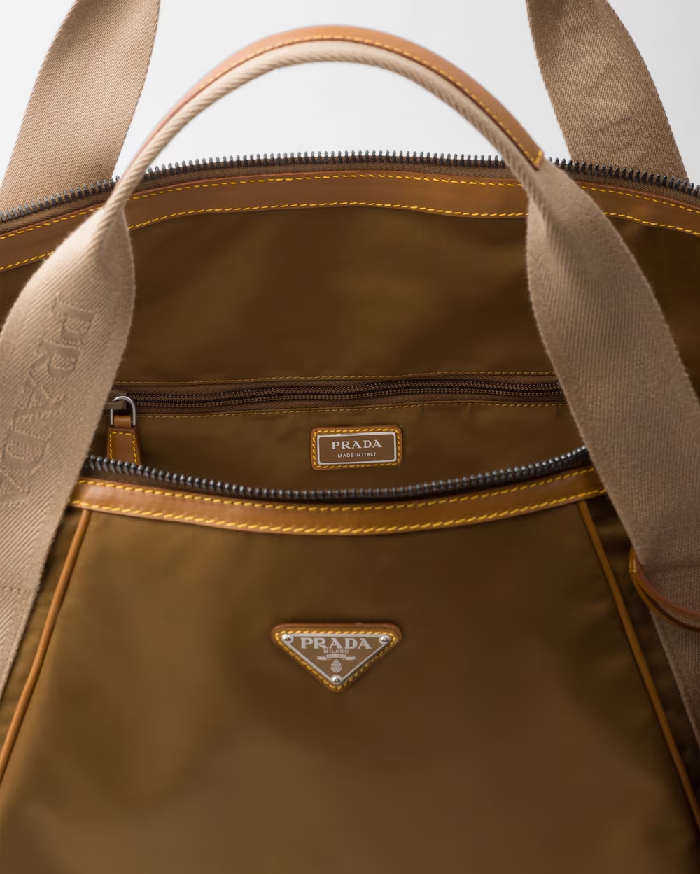 PRADA Brown Borsa a mano da viaggio in Re-Nylon e pelle